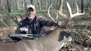 Pictured here is Phillip Vanderpool with a whitetail he killed with a compound bow.